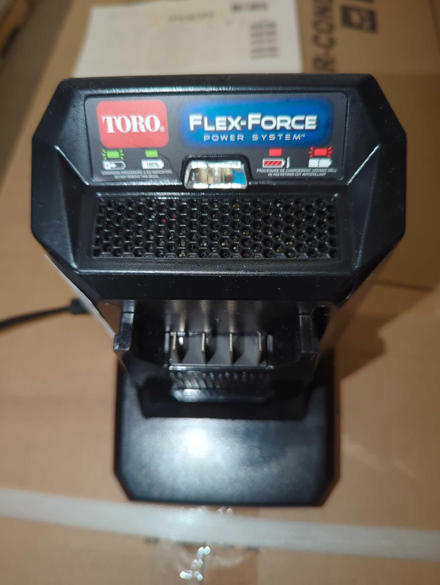 Toro Max Flex-Force 60-Volt Lithium-Ion Battery Charger, Model 88602, Retail Price $83, Appears to