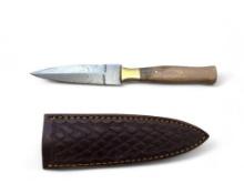 Handmade Damascus steel knives with custom wood, bone, horn or resin handles. The knives are made