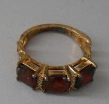 925 RING WITH RED STONES