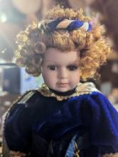 (GAR) Red Haired and Brown Eyed Porcelain Doll Wearing Blue Velvet Dress and Gold Cape,