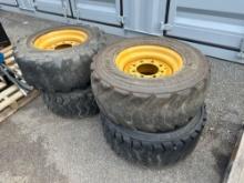 (4) 12R16.5 SKID STEER TIRES SKID STEER ATTACHMENT