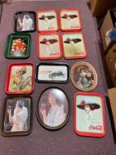 Coca-Cola trays and a peanuts lunchbox