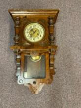 Antique regulator clock quite fancy with pendulum and key