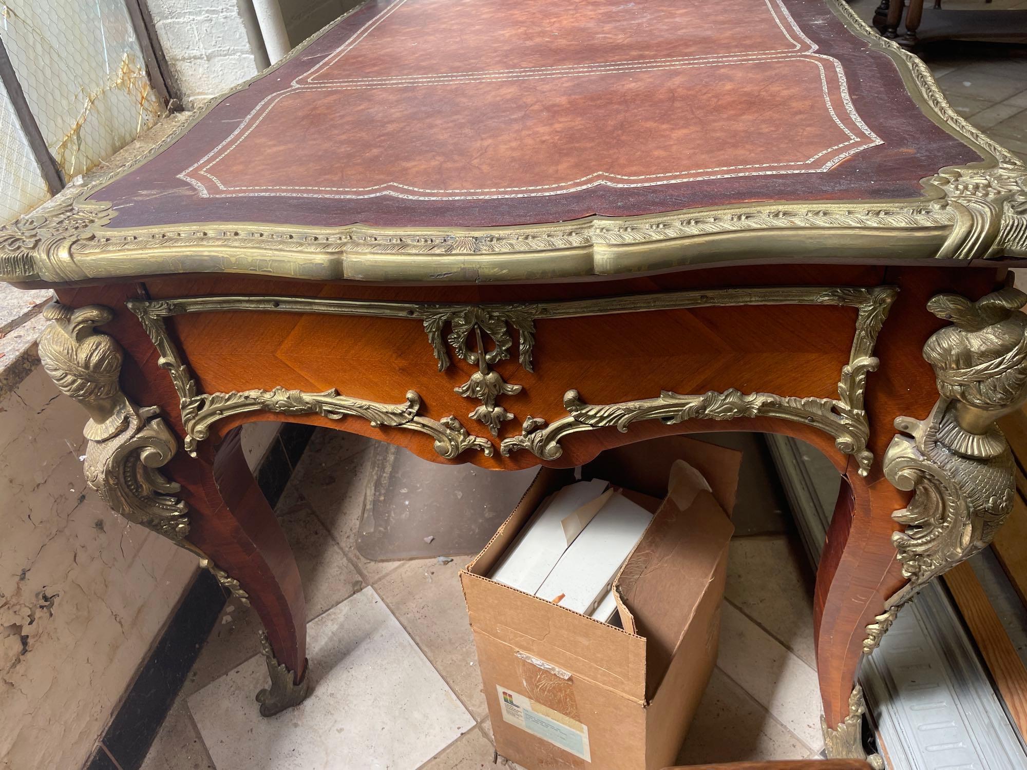 1960s French Louis XV Style Ornate Carved Wood Desk With Figural Accents and Leather Inlaid Top