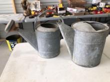 Pair of galvanized water cans