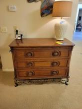 Decorative 3 drawer cabinet with ornate metal base and lamp