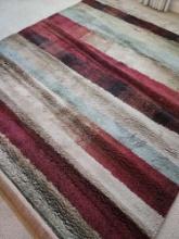Modern color blocked rug: sage, maroon, blue, tan