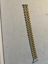Ladies 18k yellow and white gold reversible bracelet