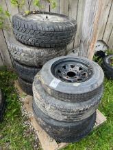 (4) wheels and tires 235/75R15 (4) other miscellaneous size tires and wheels
