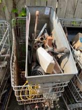 shopping cart with contents 4 way wrenches and antique tire float