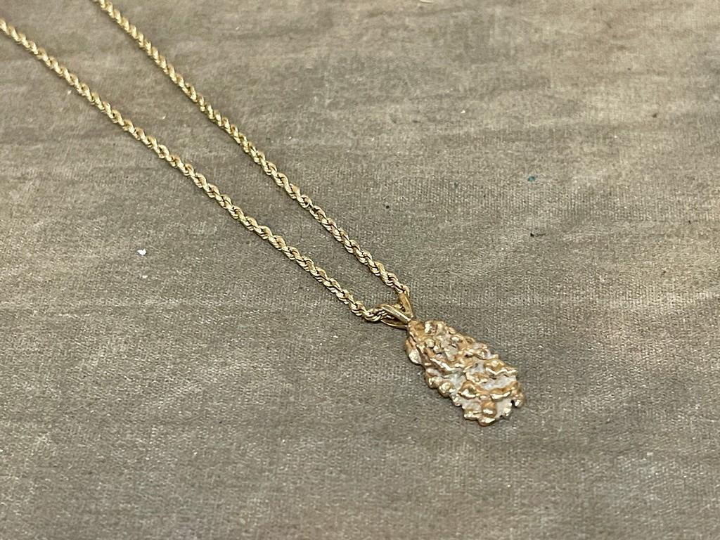 Fourteen Carat Gold Chain with a Gold Nugget