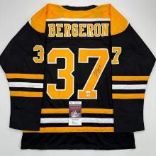 Autographed/Signed Patrice Bergeron Boston Black Hockey Jersey JSA COA