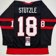Autographed/Signed Tim Stutzle Ottawa Black Hockey Jersey JSA COA