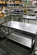 54IN. STAINLESS STEEL TABLE ON CASTERS
