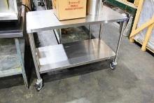 4' STAINLESS STEEL TABLE ON CASTERS